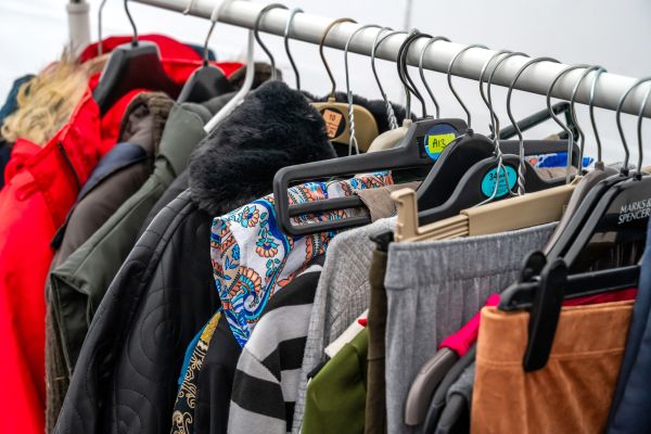Clothes hanging on rail